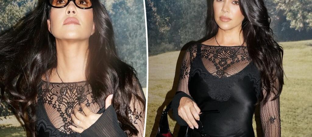 Kourtney Kardashians rocks sheer lace mini dress